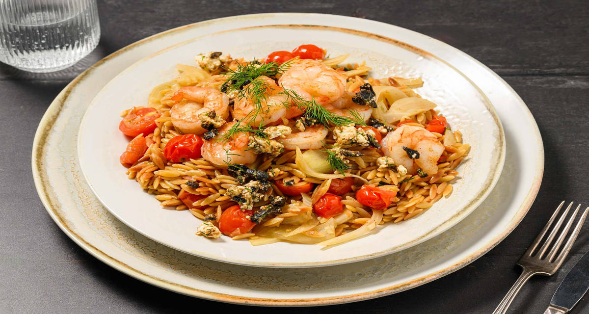 Ottolenghi style orzo served with marinated feta and cherrytomatoes.