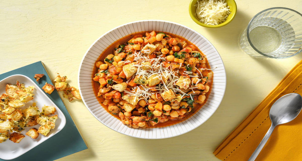 Guiso de garbanzos a la ribollita con verduras y picatostes caseros al queso italiano