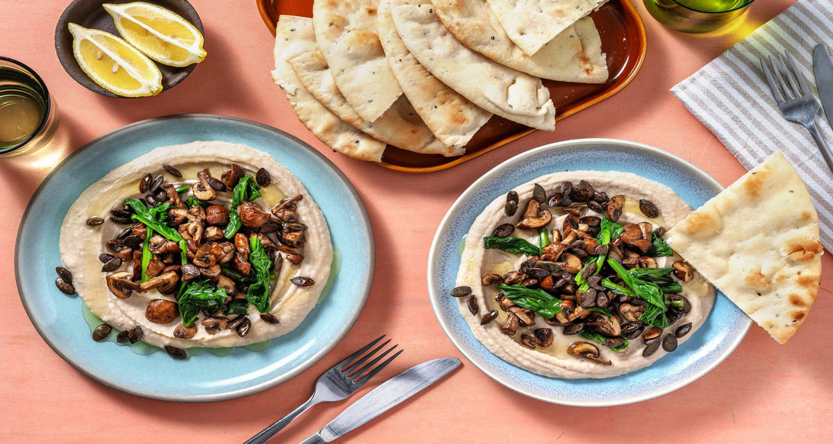 Crema autunnale di cannellini, funghi e spinaci accompagnata da pane Naan