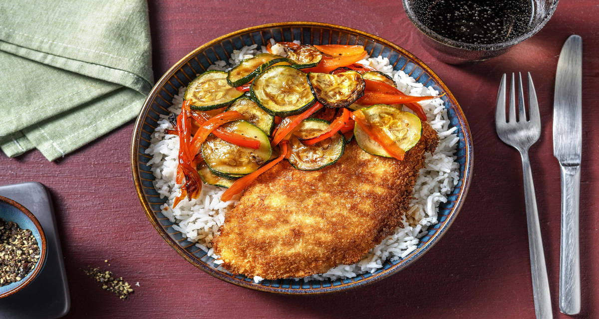 Cotoletta di pollo con riso allo zenzero e verdure glassate al forno