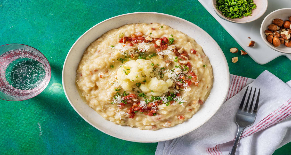 Risotto cremoso di cavolfiore con pancetta croccante e nocciole