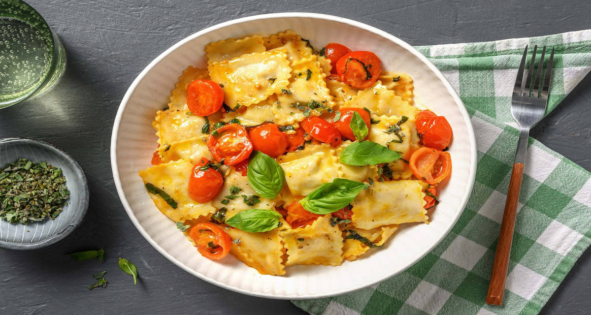 Ravioli di branzino con pomodorini confit ed erbe mediterranee