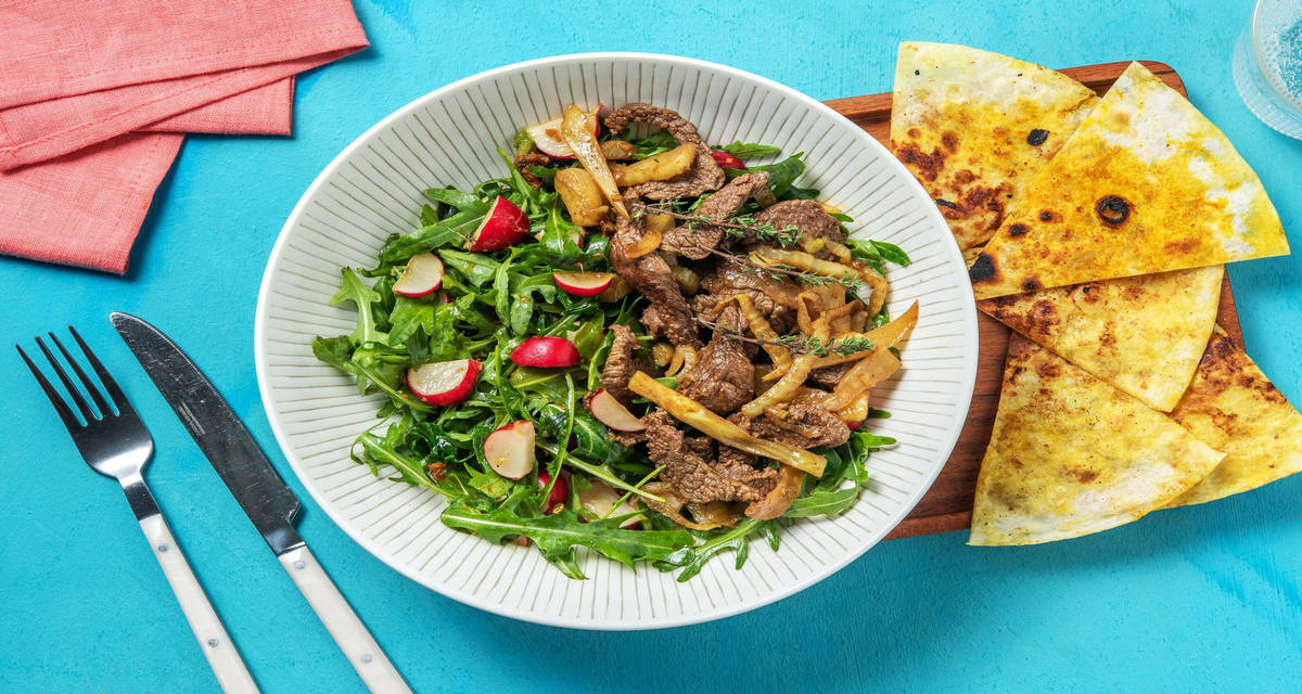 Manzo con finocchi e chips di tortillas speziate con rucola e ravanelli alla soia e zenzero