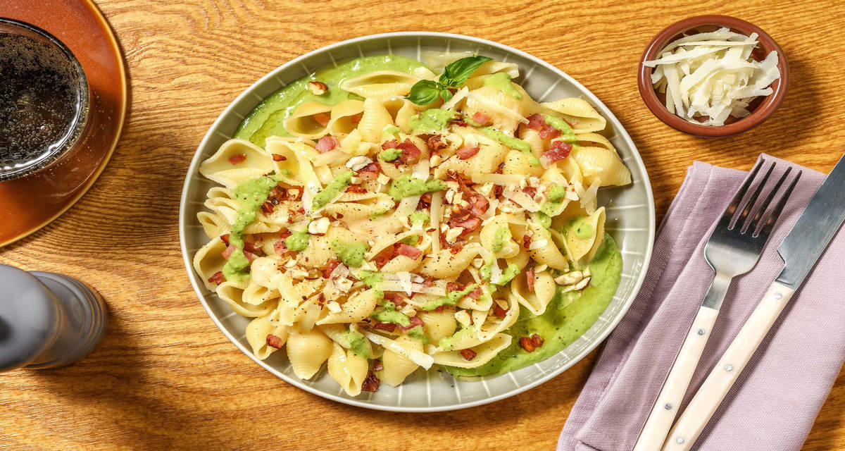 Conchiglie crema di piselli e prosciutto cotto con Grana Padano e nocciole tostate