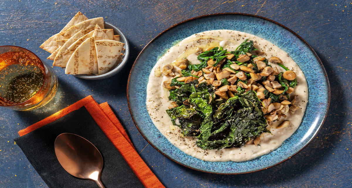 Crema di fagioli cannellini e funghi con spinaci saltati e tortillas tostate