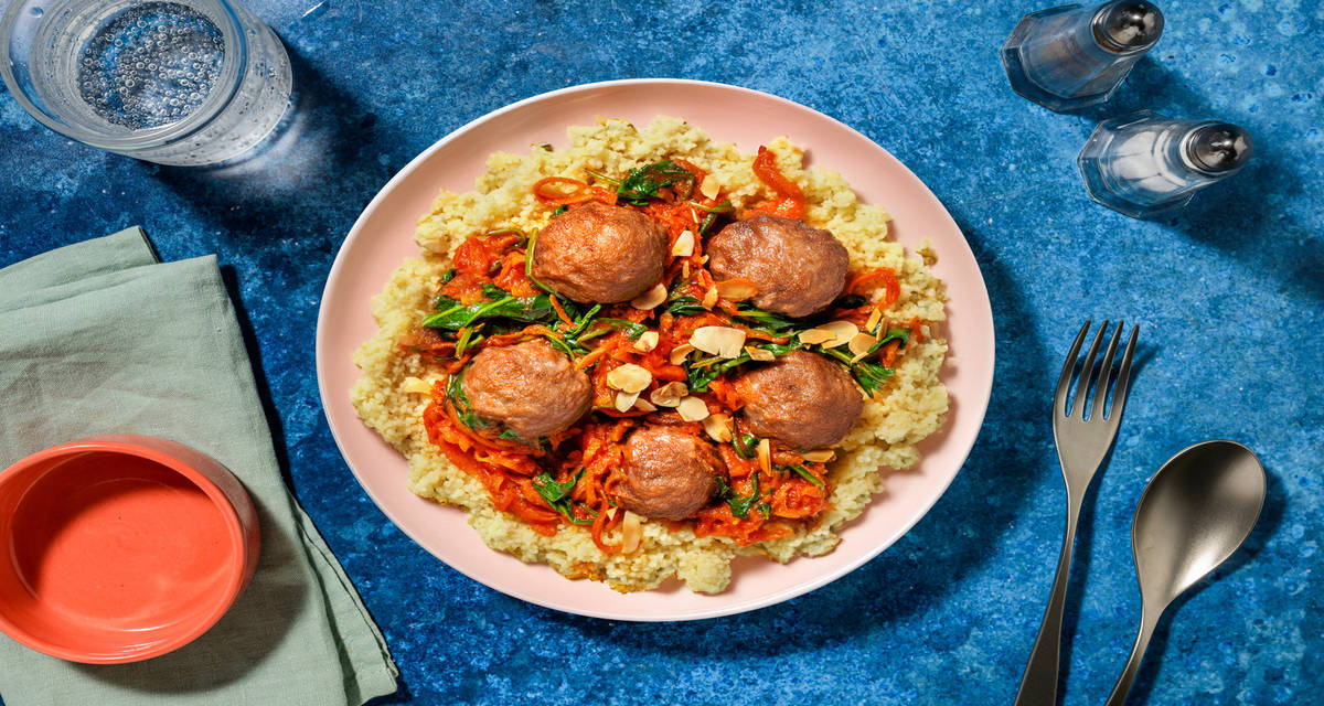 Lebanese Style Veggie Meatballs in Tomato Sauce with Spinach, Couscous and Flaked Almonds