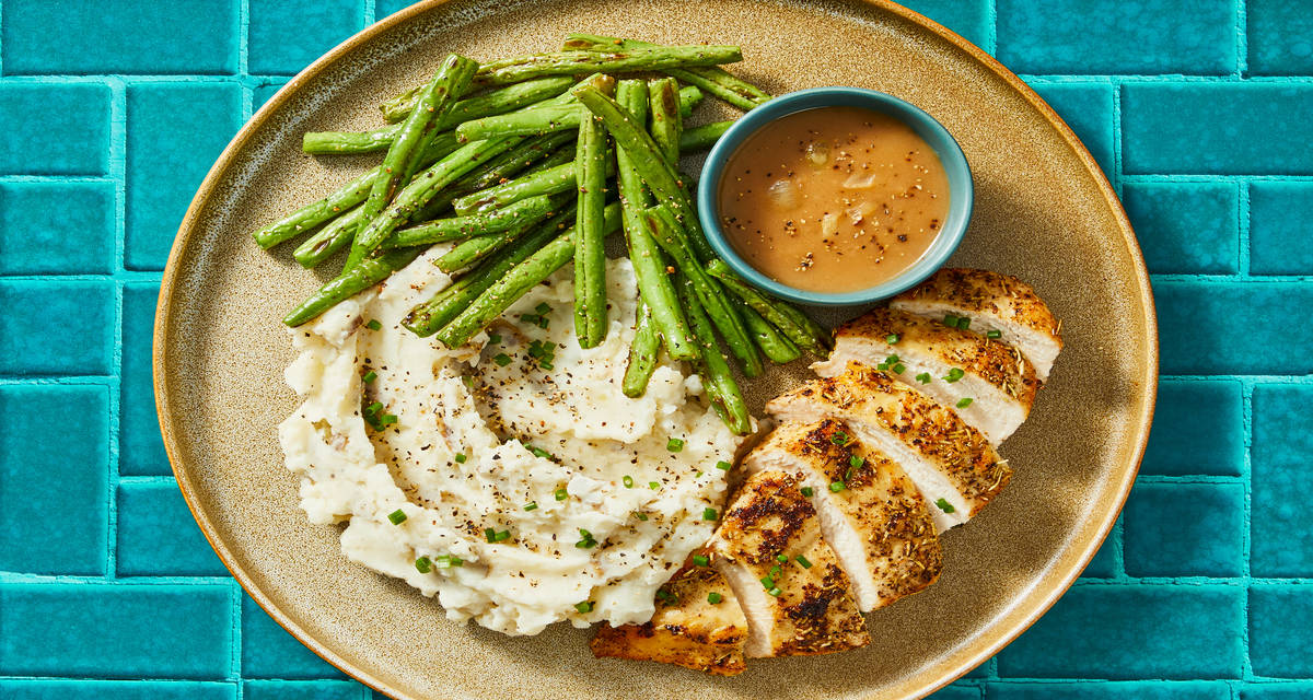 Smothered Chicken with Onion Gravy plus Mashed Potatoes & Garlicky Green Beans
