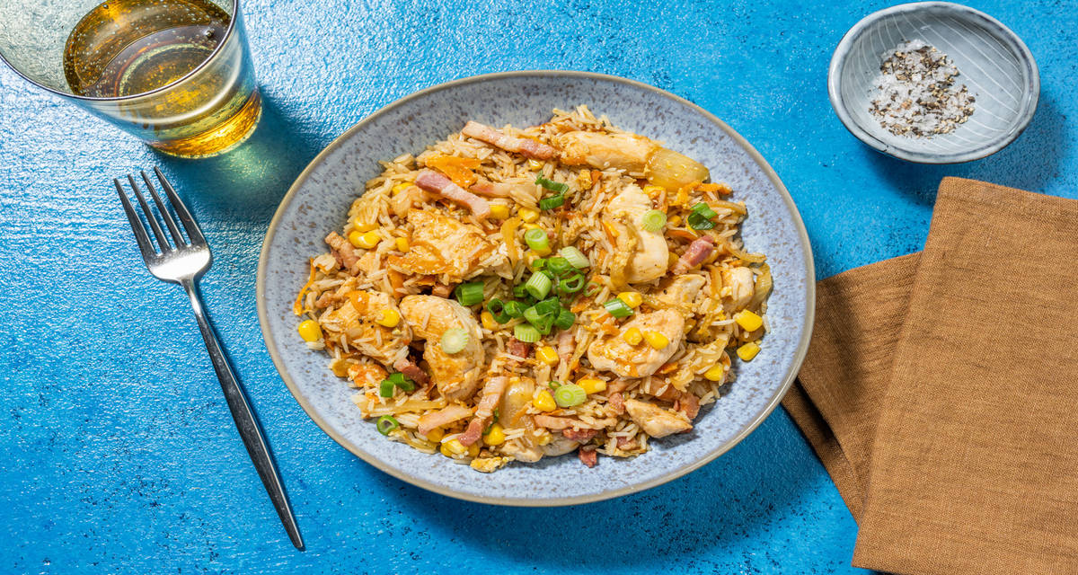 Arroz 7 delicias con pollo salteado con bacon, verduras y aliño asiático