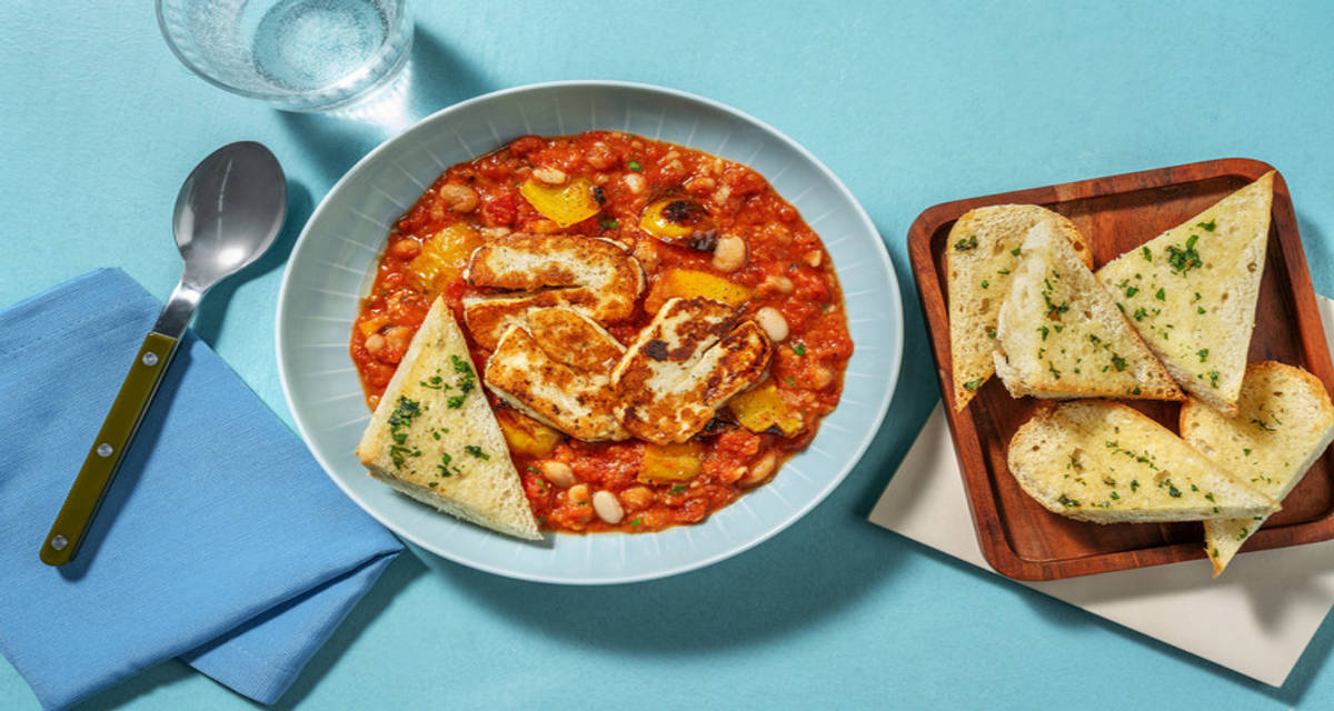 Harissa Spiced Cannellini Bean Stew with garlic bread and golden fried cheese