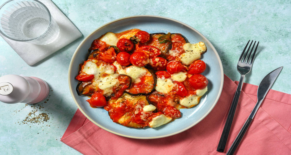 Parmigiana di melanzane e mozzarella con Grana Padano Dop e basilico fresco