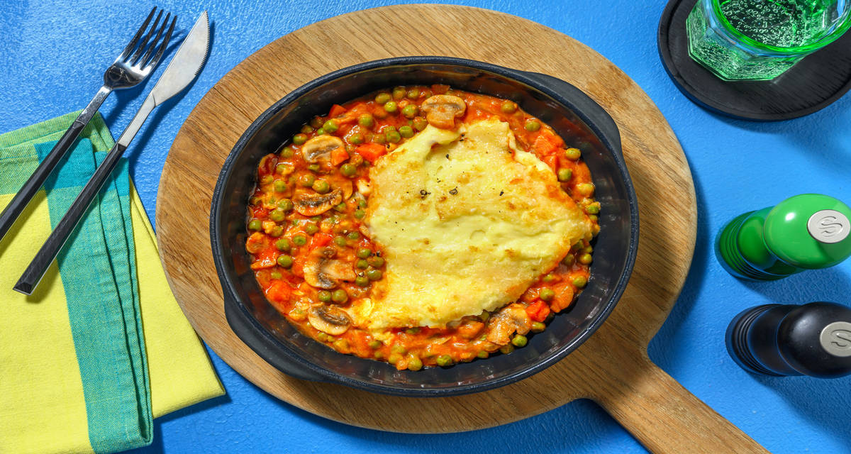 Sformato di patate "alla Greg" con sugo di funghi, piselli e formaggio