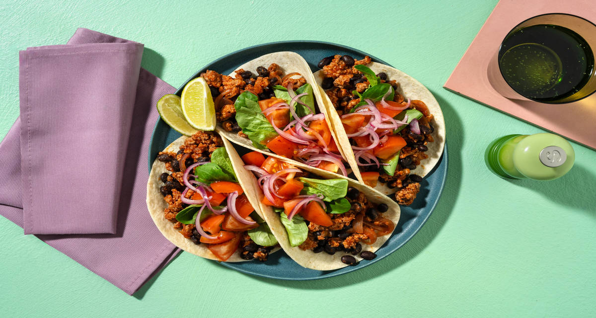 Turkey Mince and Black Bean Tacos with chipotle tomatoes and pickled onion