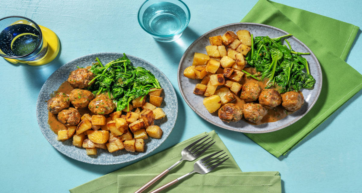 Polpette in salsa di burro e pasta di miso con patate dorate e spinacini baby