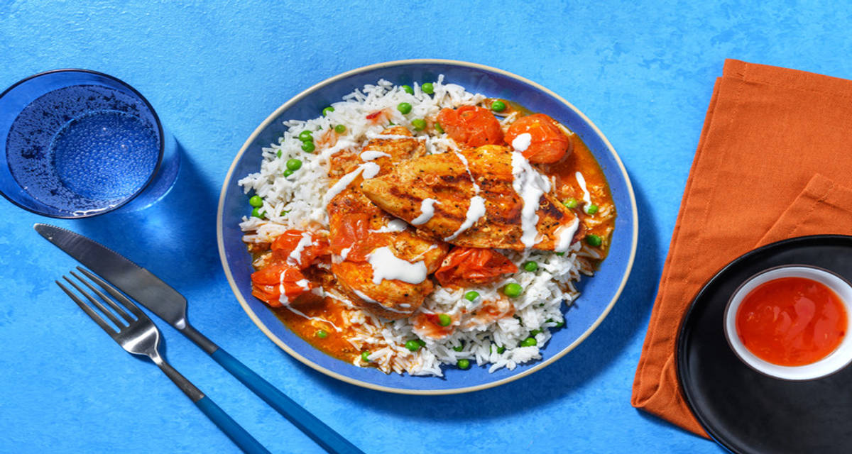 Paprika Chicken and Cherry Tomatoes with green peas and rice