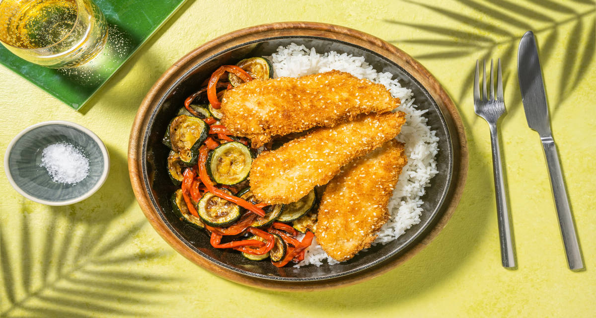 Poulet pané au sésame & riz parfumé garni de courgette & poivron sauce miel-soja