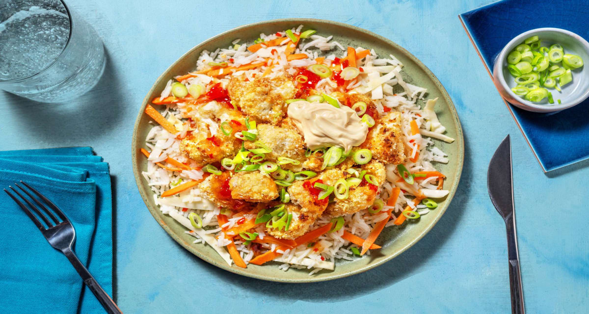 Crispy sesambloemkoolstukjes met rijst en zoetzure wittekool en wortel-image