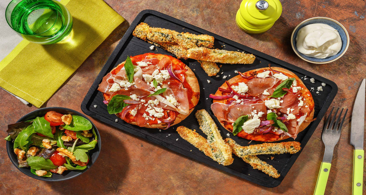 Prosciutto- och getostpitapizza med zucchinipommes och ranchdressing