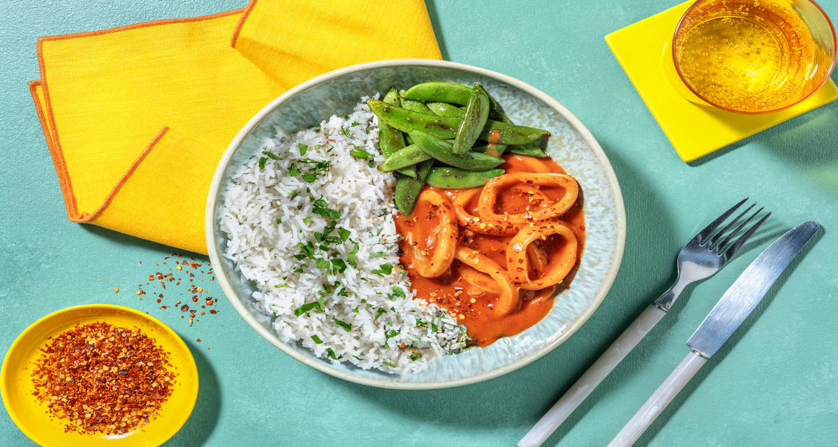 Calamar gigante en salsa estilo americana acompañado de arroz basmati con perejil
