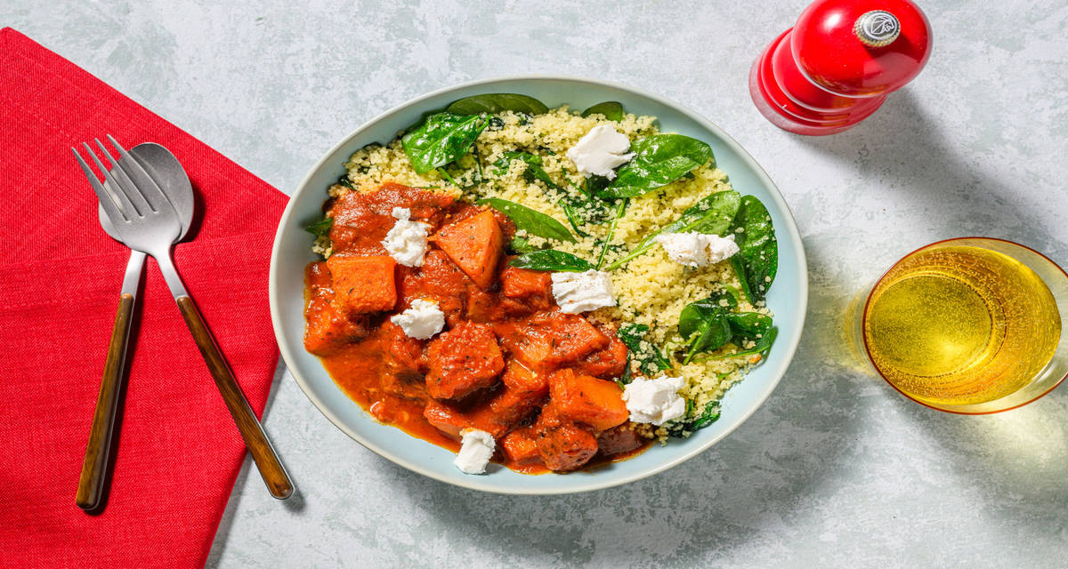 Calabaza caramelizada con queso de cabra sobre cuscús con espinacas