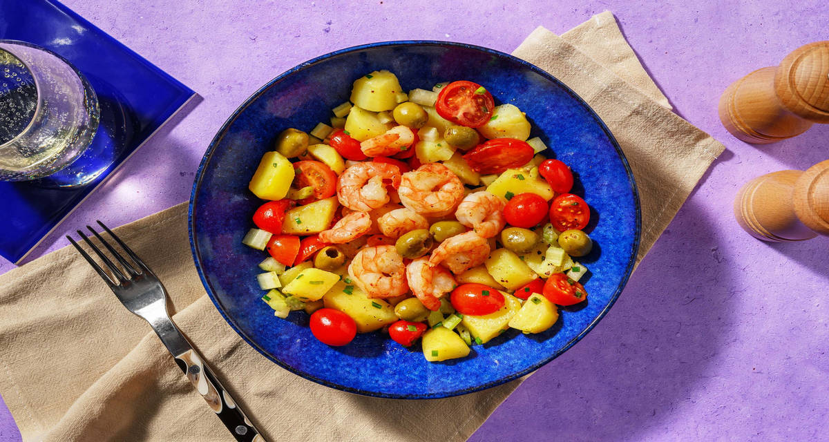 Insalata di mare ai gamberi, olive e patate con pomodorini e citronette all'erba cipollina