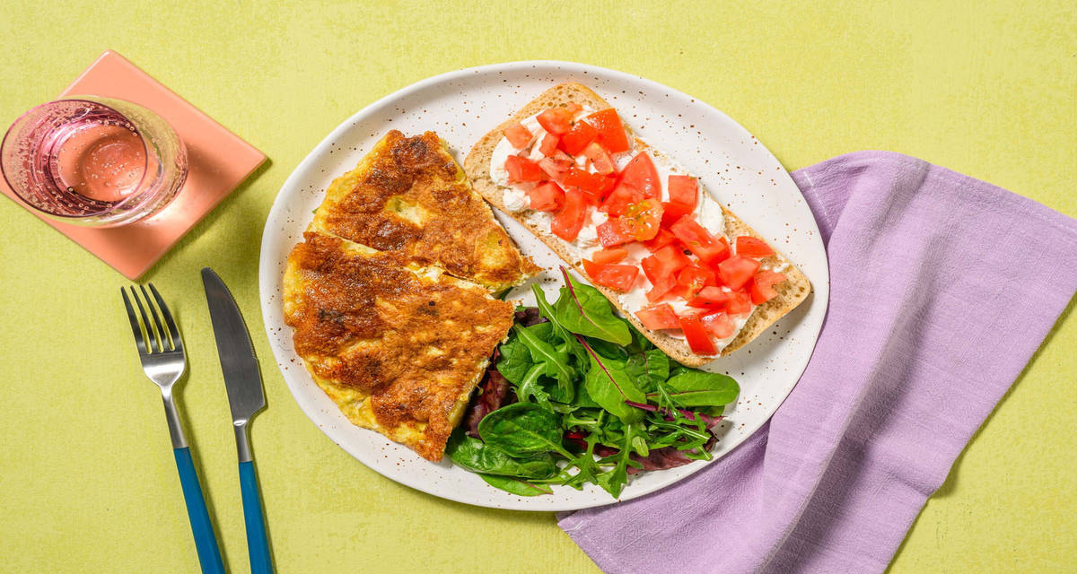 Tortilla de patatas - frittata alla spagnola con bruschette al caprino e pomodoro