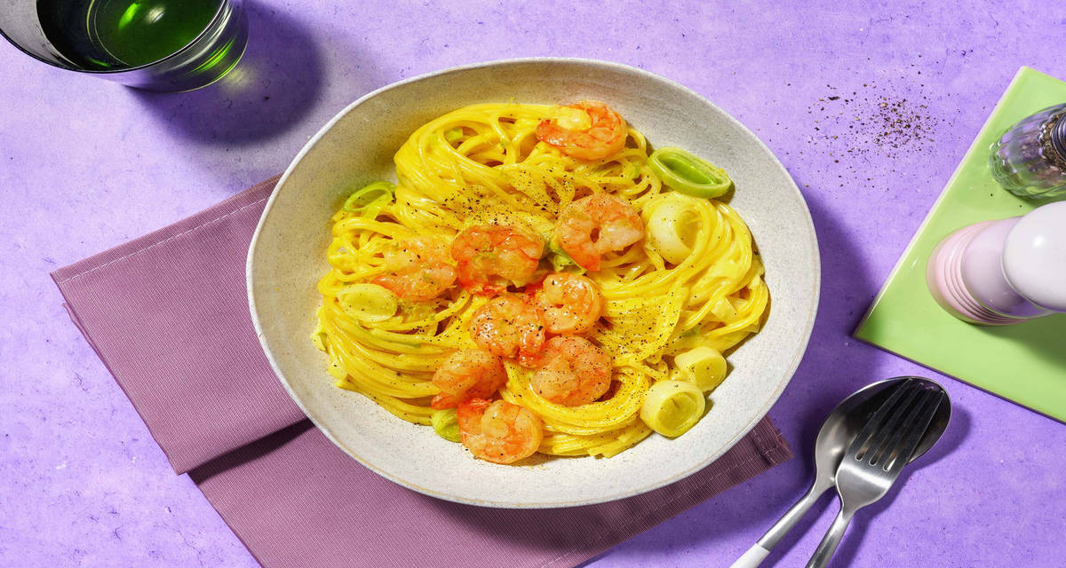 Spaghetti golosi allo zafferano e gamberi con porro, panna e limone