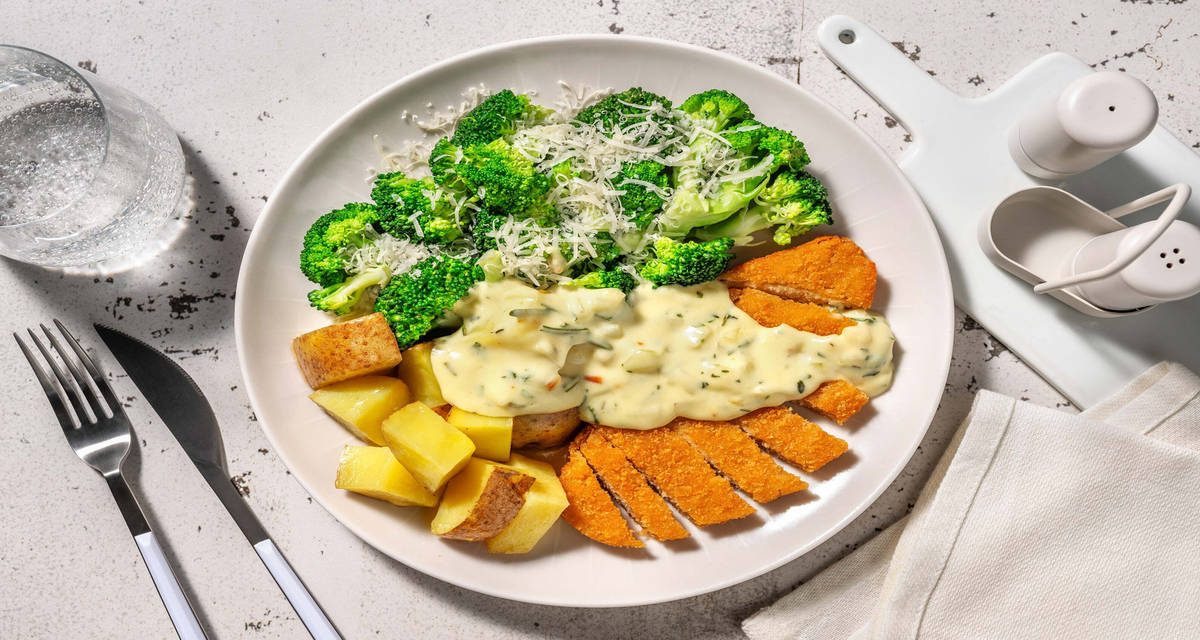 Escalope panée végétarienne en sauce crémeuse au parmesan épices siciliennes, brocoli et pommes de terre