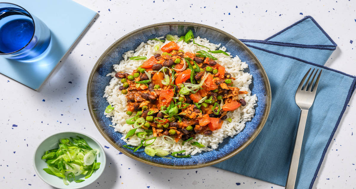 Tofu and Black Bean Chipotle Chilli with peas and rice