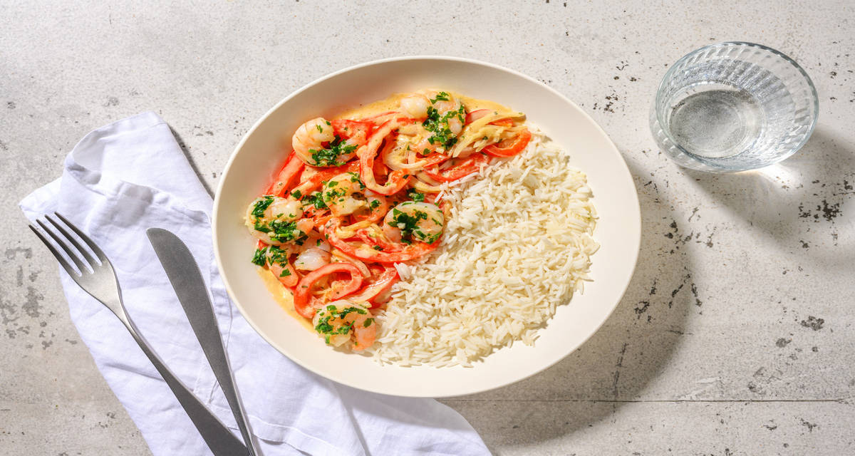 Crevettes en persillade & poivrons dorés avec une sauce crème & du riz