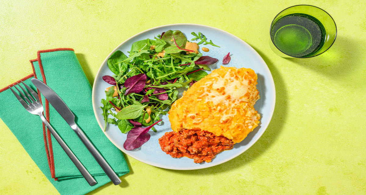 Gratin tex-mex de bœuf & patate douce avec de la sauce tomate & du cheddar