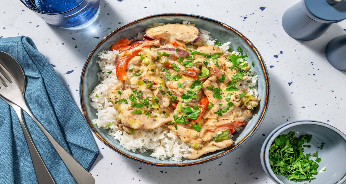 Poulet crémeux en sauce au poireau et fromage riz, poivron et persil