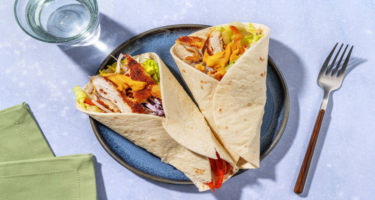 Wraps met krokante kip met mangoketchup en regenboogkoolsla