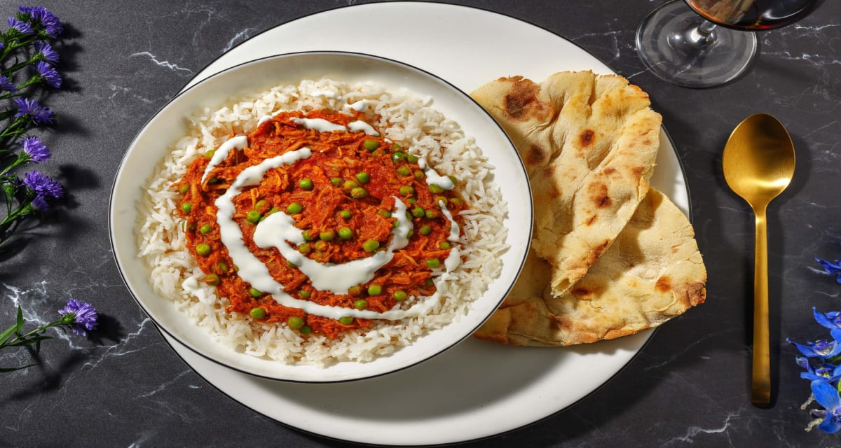 Easy Pulled Pork Rogan Josh Curry with Peas, Quick Rice, Naan and Yoghurt Drizzle-image