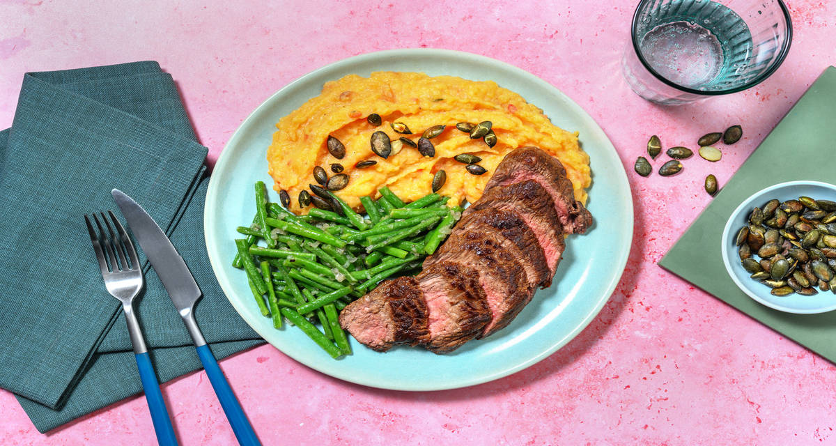 Entrecôte & purée de patate douce relevée haricots verts poêlés à l'ail et graines de courge