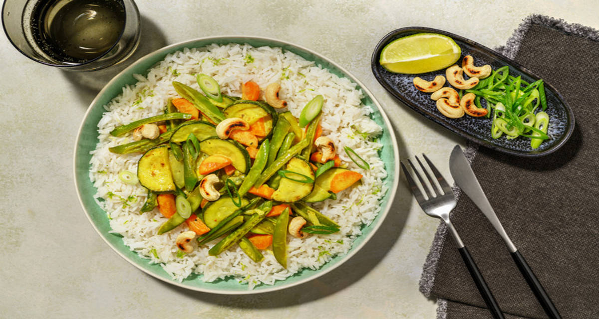 Coconut Courgette Curry with Tofu with sugar snaps and rice