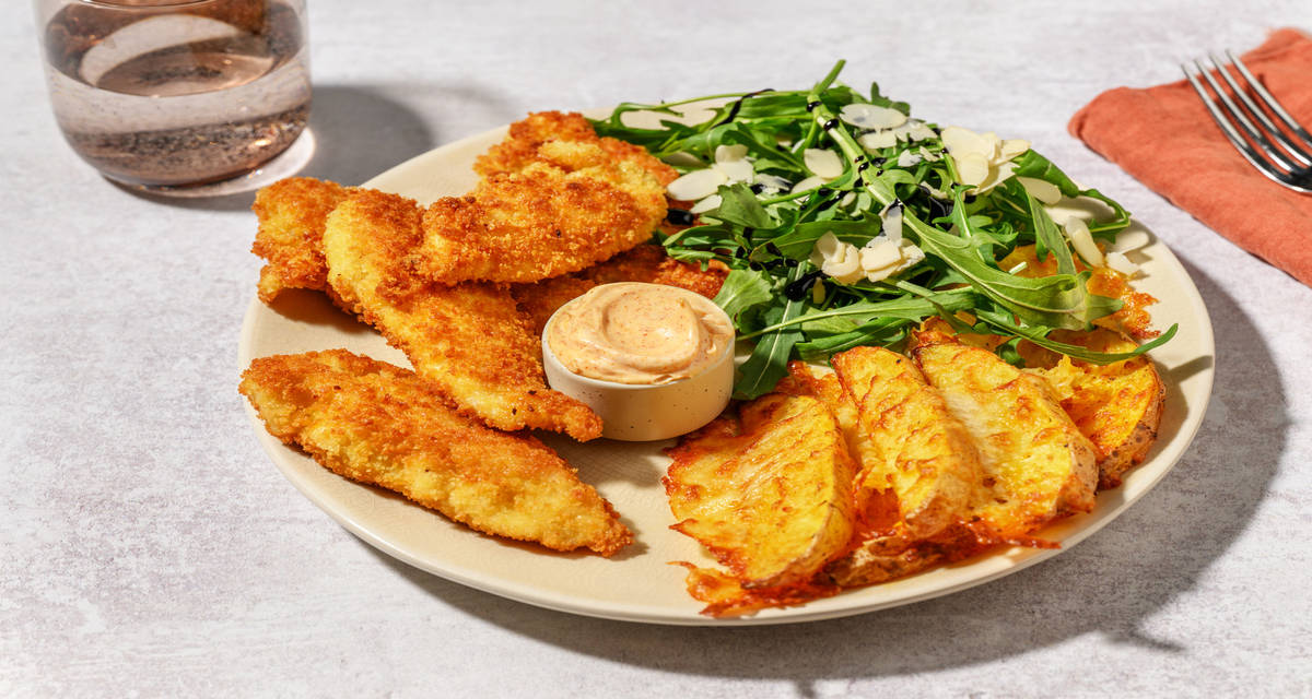 Crispy Turkey Tenders with cheesy wedges, paprika mayo and salad