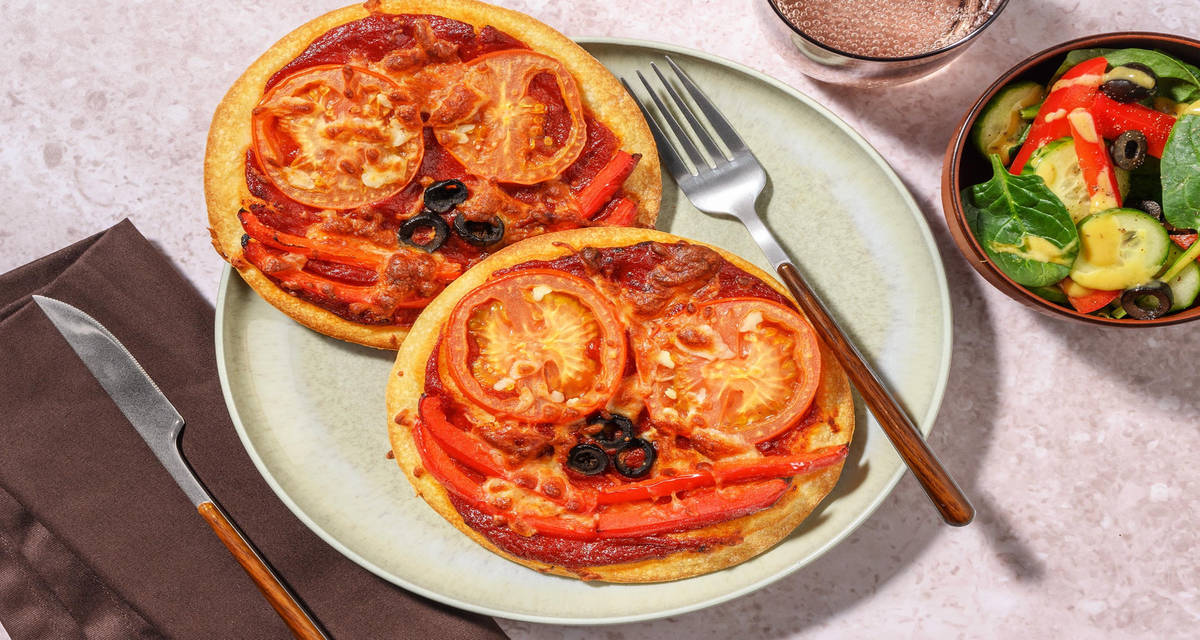 Minipizza-ansigter Byg din egen - nyd sammen