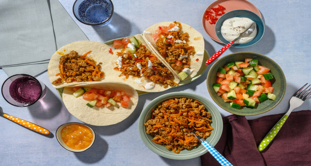 Curried Beef Tacos with yoghurt and mango chutney