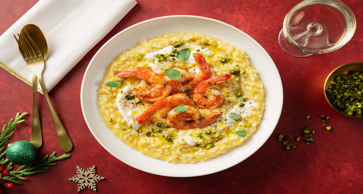Risotto alla zucca, gamberi e burrata con granella di pistacchi e maggiorana