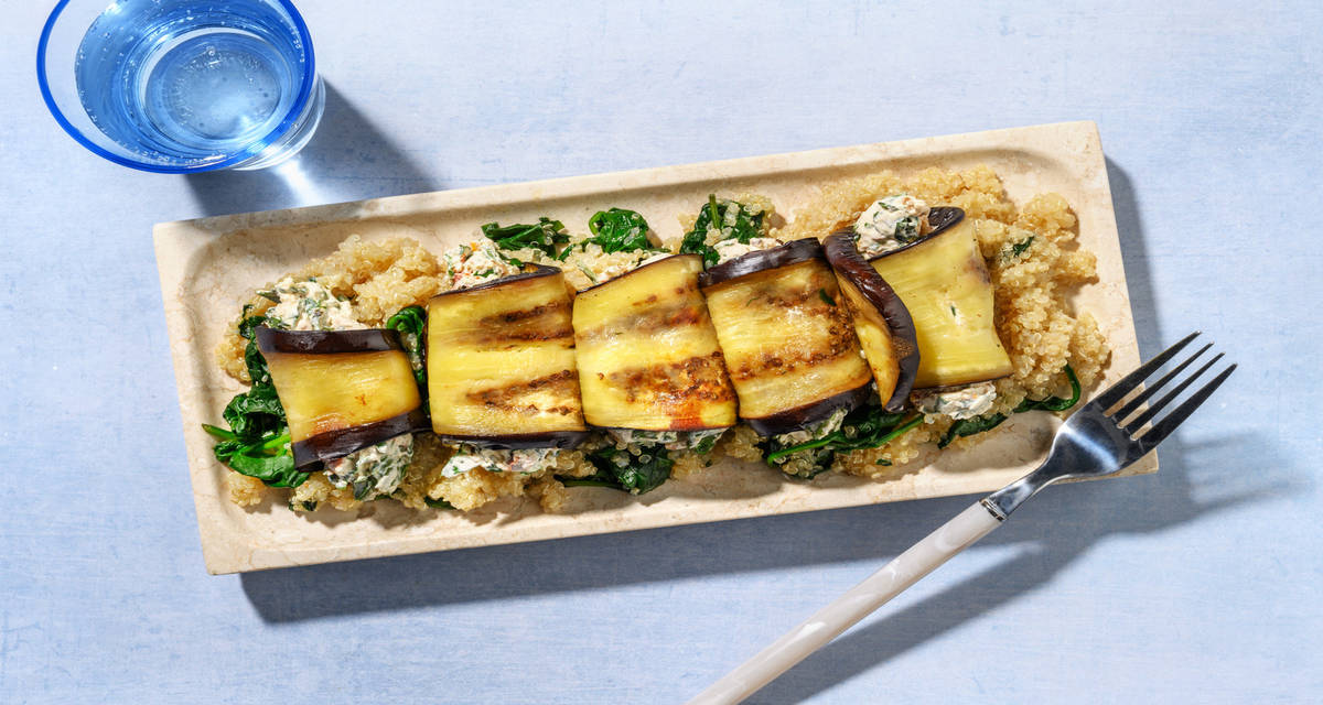 Berenjenas a la toscana con ricotta y tomate seco con quinoa salteada con ajo y espinacas