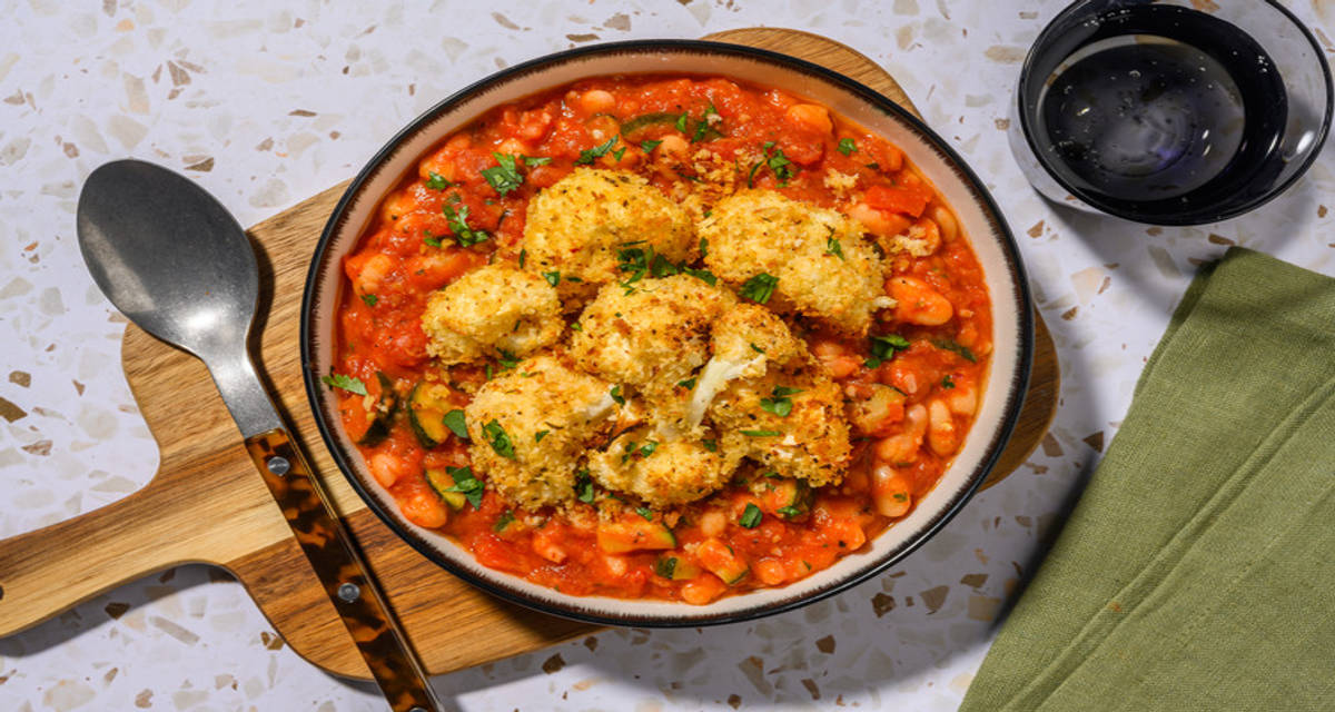 Crispy Cauliflower Topped Bean Chilli with Prawns with courgette and coriander
