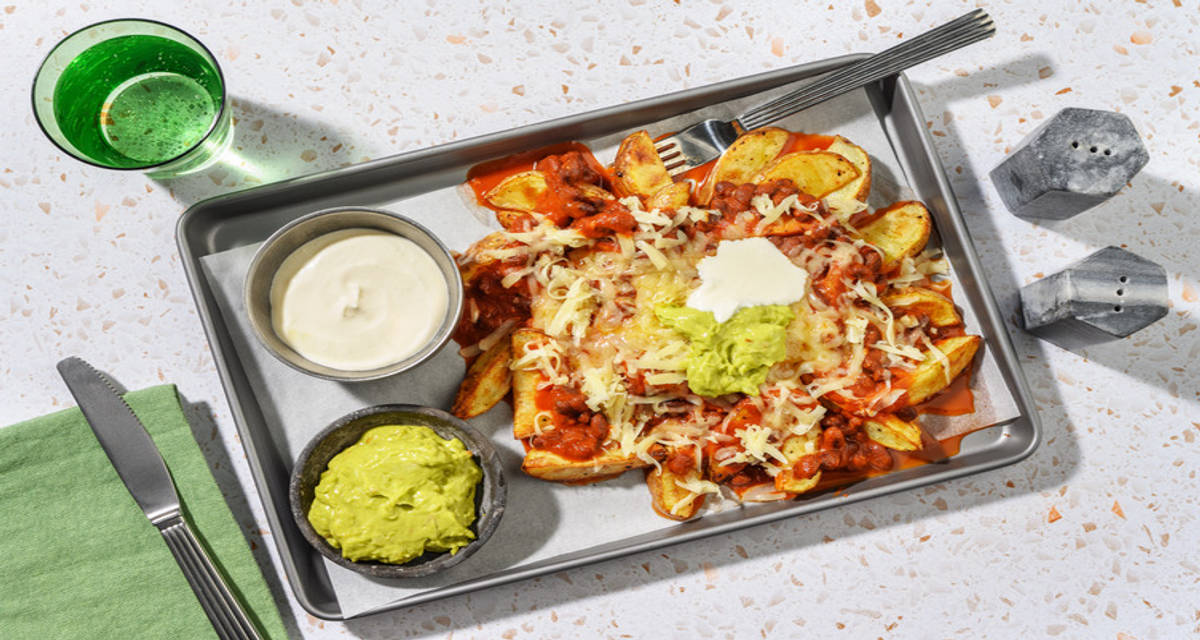 Mexican Bean Loaded Wedges with cheese, smashed avo and creme fraiche