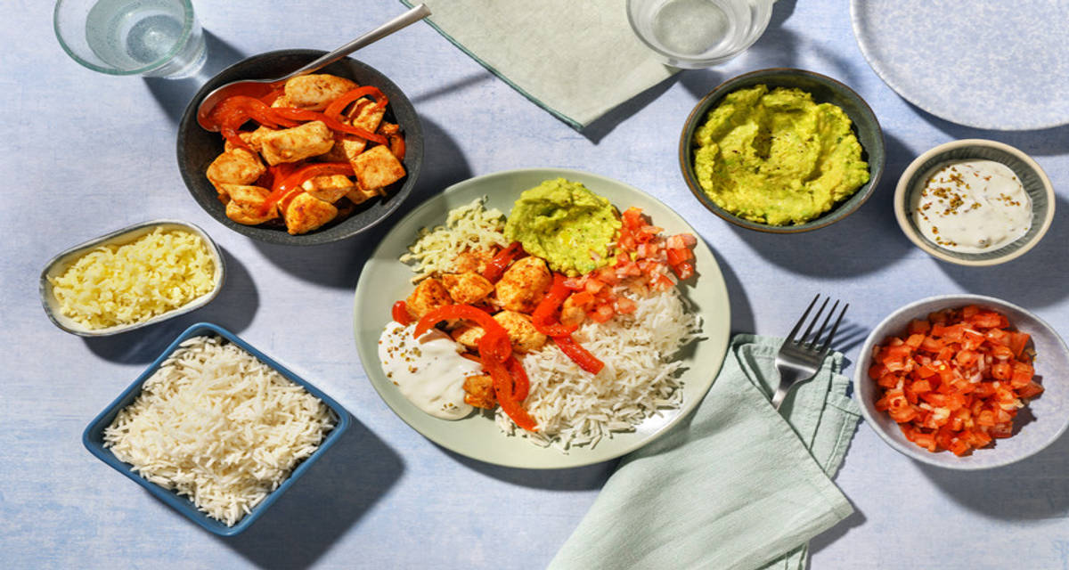 Peri Peri Spiced Chicken Rice Bowl with smashed avocado