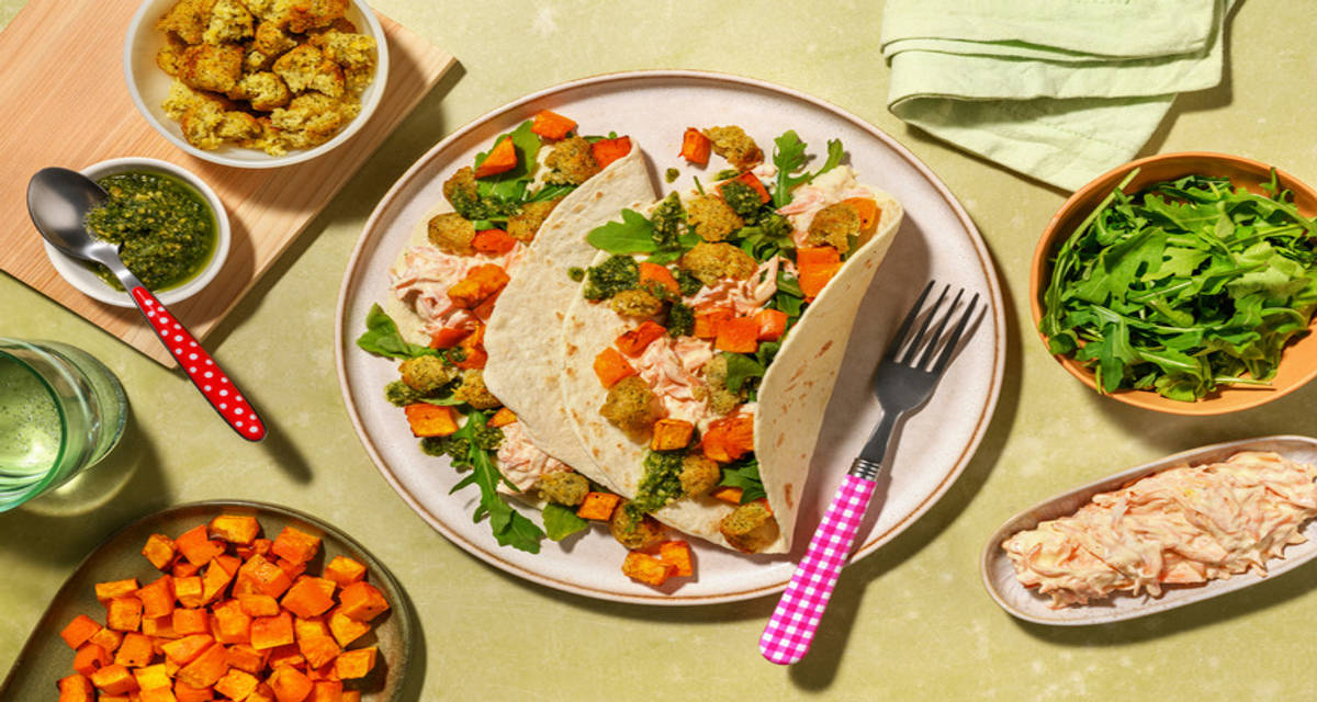 Falafel and Butternut Wraps with Cheese with salad and pesto sauce