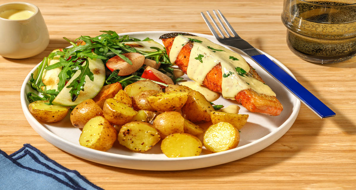Salmon Hollandaise with parsley butter potatoes and salad