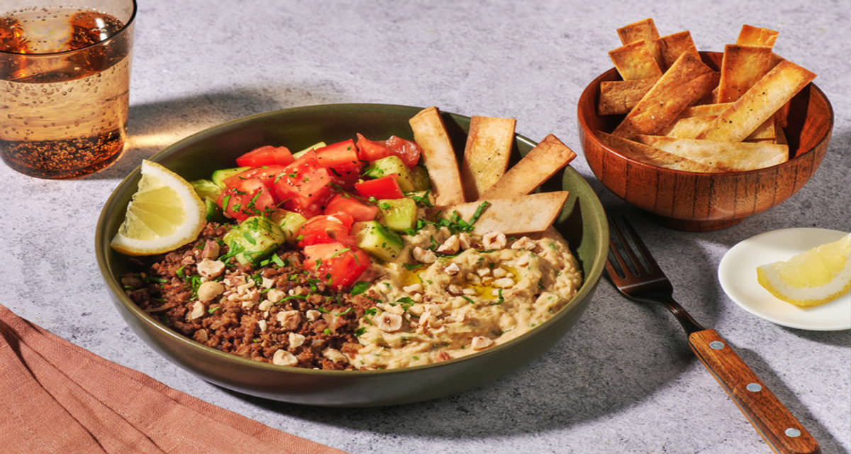 Middle Eastern Beef Mince and DIY Hummus with tomato and cucumber salad and homemade tortilla strips
