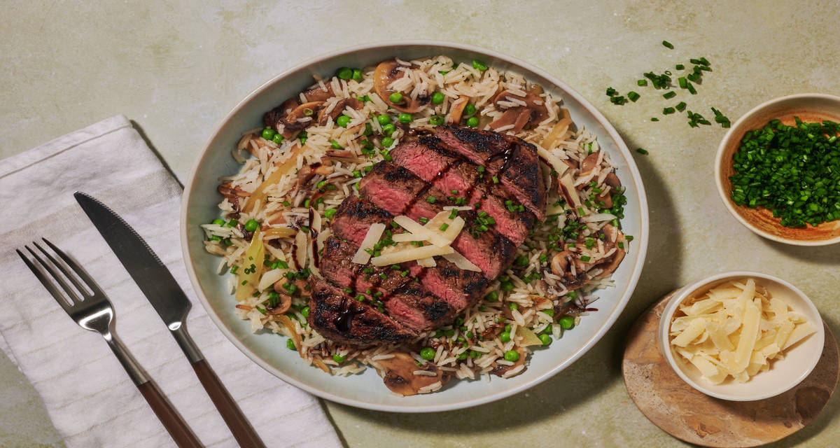 Pan-seared Paprika Beef Rump and Black Garlic Rice with peas and chives
