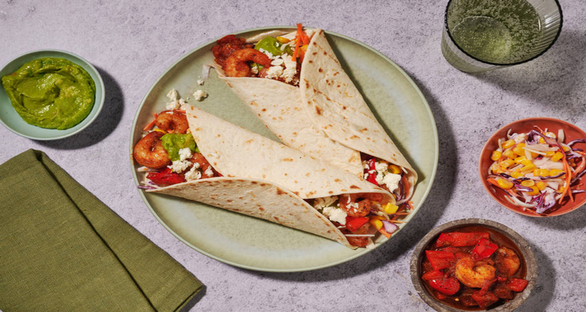 Wraps de crevettes sauce chili doux & guacamole salade de chou, carotte, maïs et citron vert