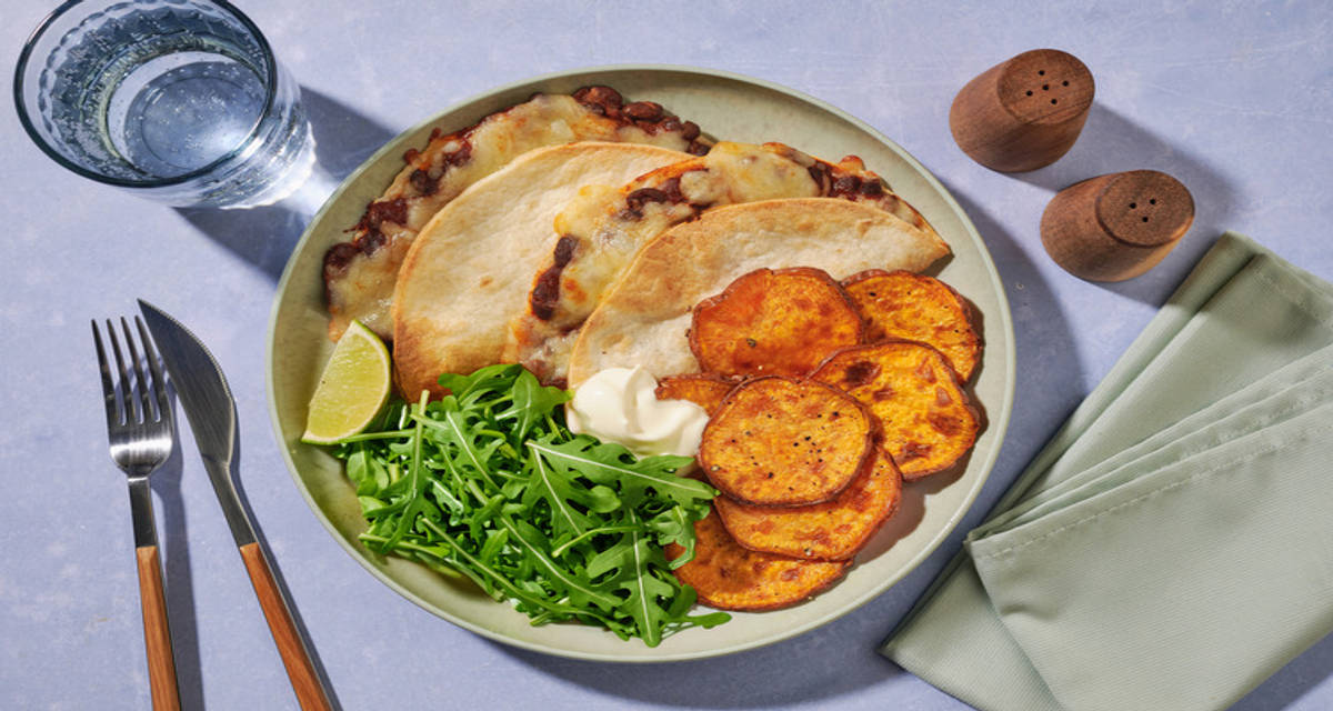 Brazilian Feijoada-inspired Bean Tortilla with creme fraiche and roasted sweet potato