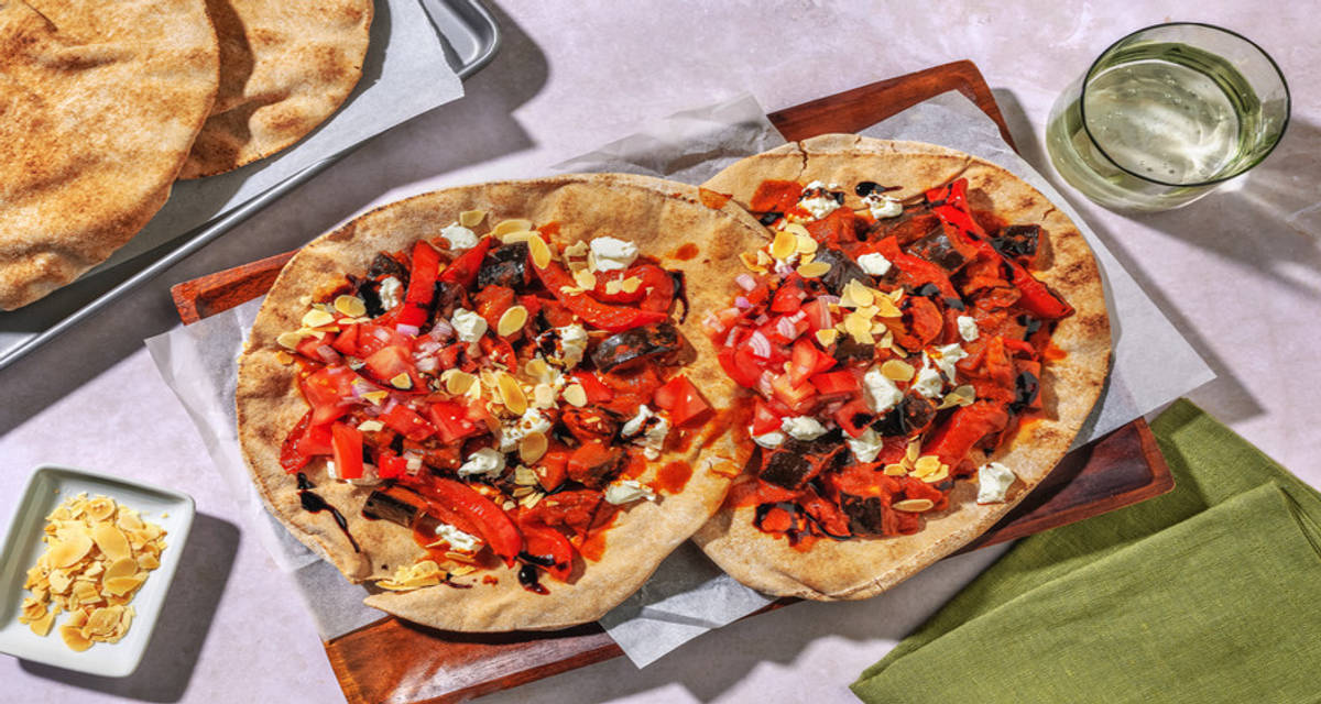 Loaded Veggie Lebanese Flatbreads with pomegranate mollasses, toasted almonds and salsa